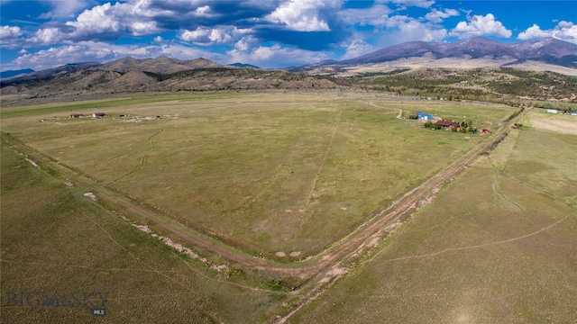 bird's eye view featuring a mountain view and a rural view