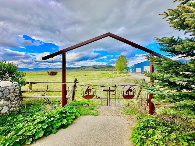 exterior space with a mountain view and a rural view