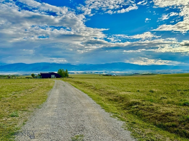 view of mountain feature with a rural view