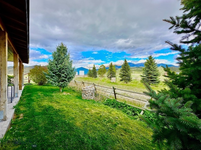 view of yard with a mountain view