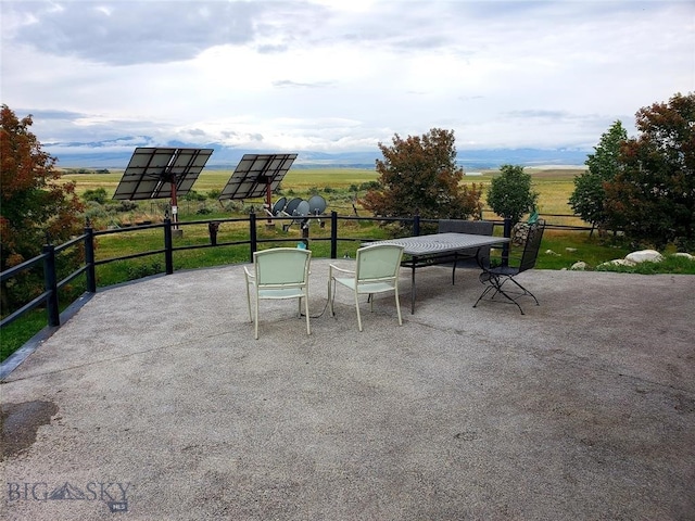 view of patio / terrace featuring a rural view