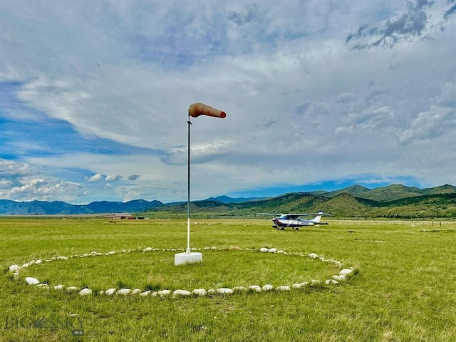 property view of mountains featuring a rural view