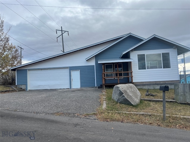 view of front of property featuring a garage