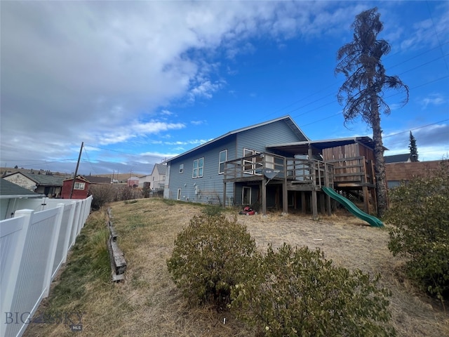 rear view of house with a deck