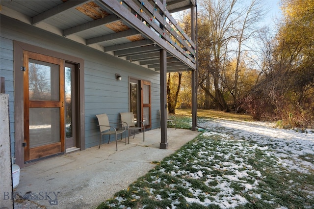 view of snow covered patio