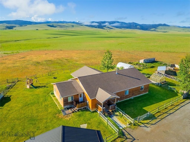 bird's eye view featuring a mountain view and a rural view