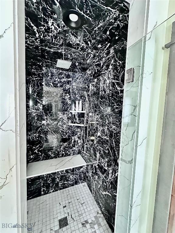401 Mill Crk, Sheridan, MT 59749 - full bathroom featuring a marble finish shower
