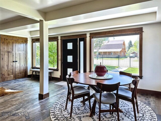 401 Mill Crk, Sheridan, MT 59749 - dining room featuring plenty of natural light, baseboards, and dark wood-style floors