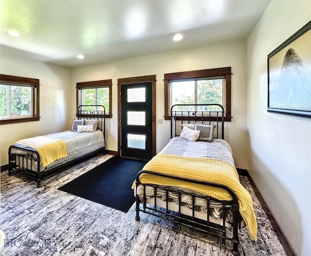 401 Mill Crk, Sheridan, MT 59749 - bedroom featuring baseboards, wood finished floors, and recessed lighting