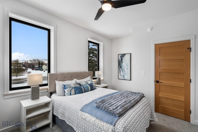 carpeted bedroom featuring ceiling fan