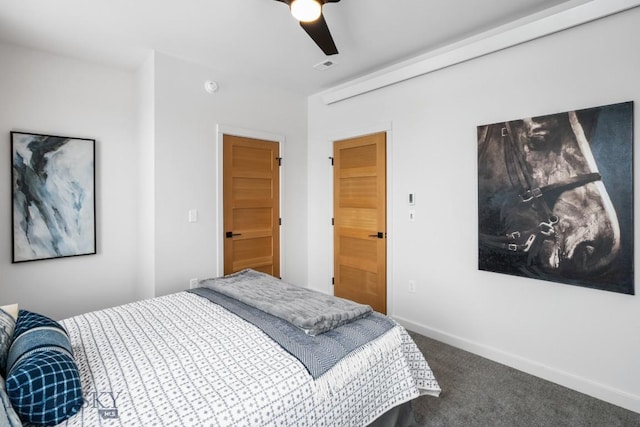 bedroom featuring ceiling fan and carpet