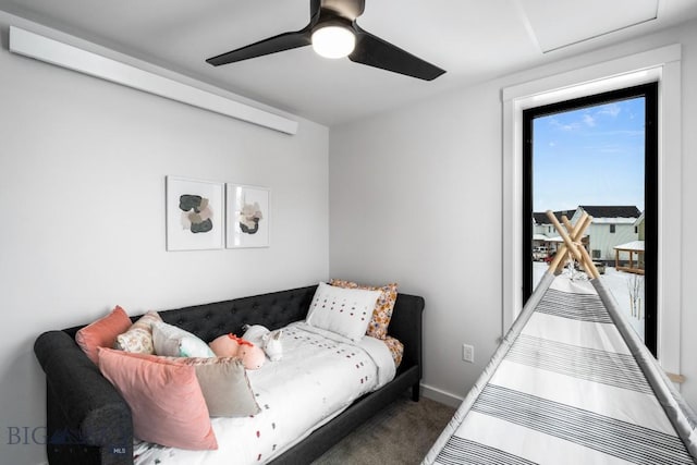 bedroom with ceiling fan and carpet flooring