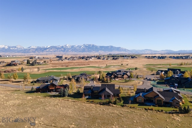 drone / aerial view with a mountain view and a rural view