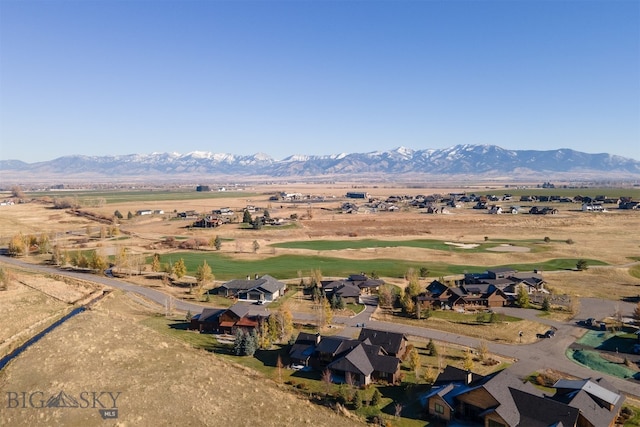 drone / aerial view featuring a mountain view