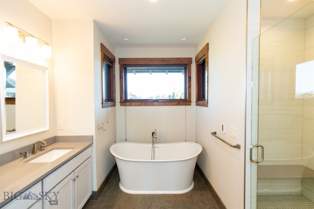 bathroom featuring vanity and plus walk in shower