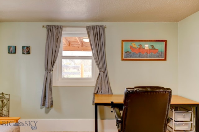 office space featuring a textured ceiling