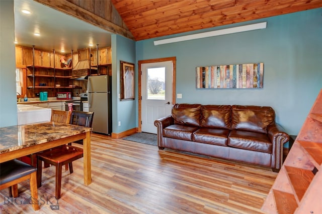 living room with lofted ceiling, light hardwood / wood-style flooring, and wooden ceiling