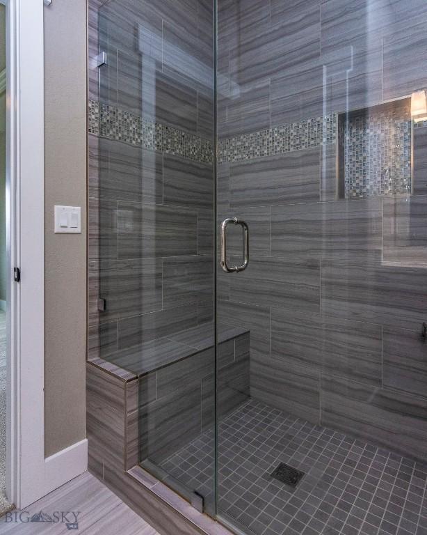bathroom featuring a stall shower