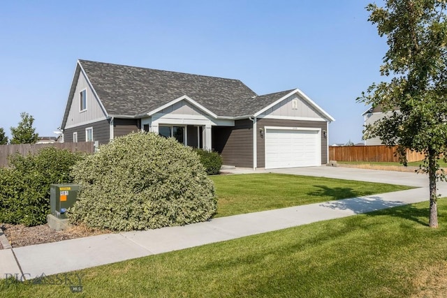 2133 Stewart Loop, Bozeman, MT 59718 - view of front of house featuring driveway, a garage, and roof with shingles