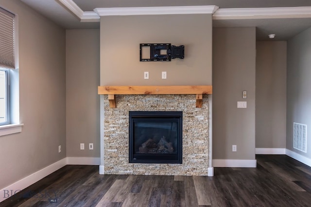 unfurnished living room with a fireplace, dark wood-type flooring, and ornamental molding