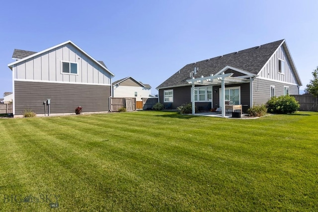 2133 Stewart Loop, Bozeman, MT 59718 - rear view of property with board and batten siding, a pergola, a patio, and roof with shingles