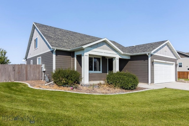 view of front facade featuring an attached garage, board and batten siding, fence, and a front lawn