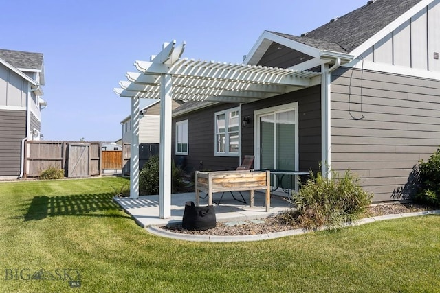rear view of house featuring a pergola, a lawn, board and batten siding, fence, and a patio