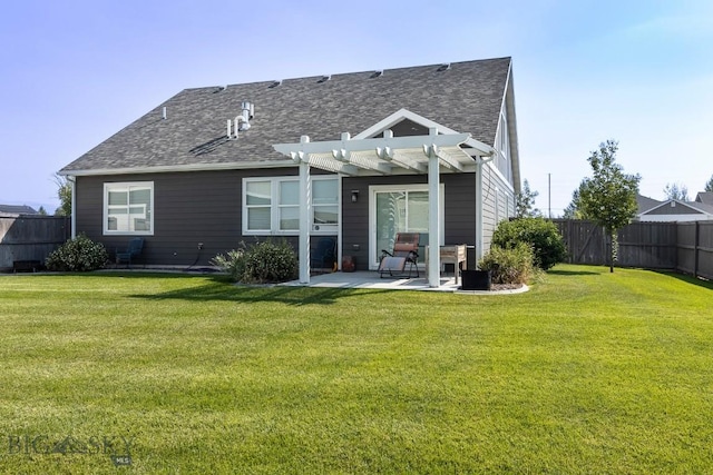 rear view of house featuring fence, a patio, a lawn, and a pergola