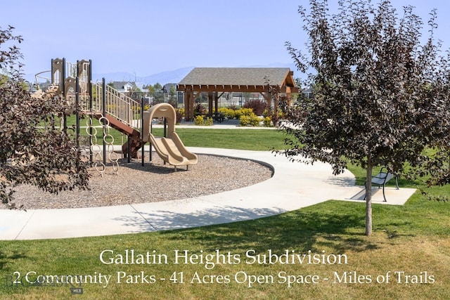 view of play area featuring a mountain view, a gazebo, and a yard