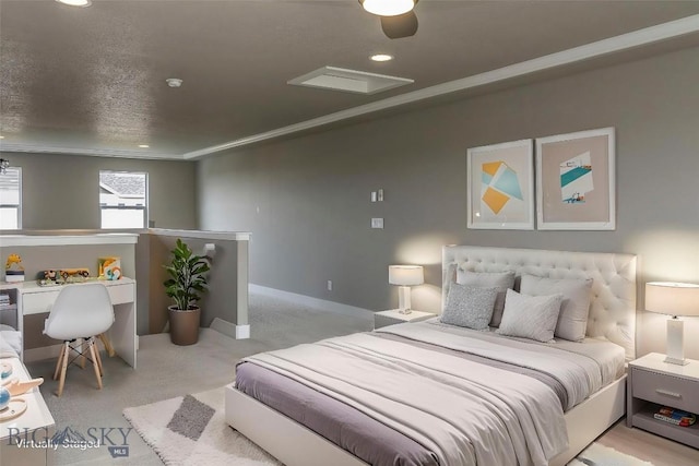 carpeted bedroom with baseboards and a textured ceiling