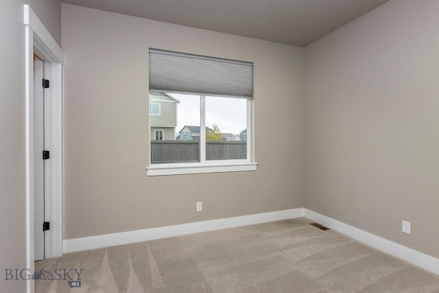 2133 Stewart Loop, Bozeman, MT 59718 - carpeted spare room featuring baseboards