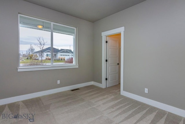2133 Stewart Loop, Bozeman, MT 59718 - unfurnished room with light colored carpet and baseboards