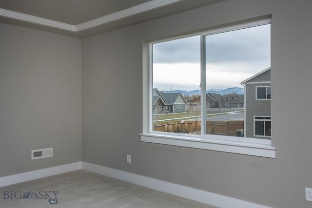 2133 Stewart Loop, Bozeman, MT 59718 - carpeted spare room featuring healthy amount of natural light, a mountain view, and ornamental molding