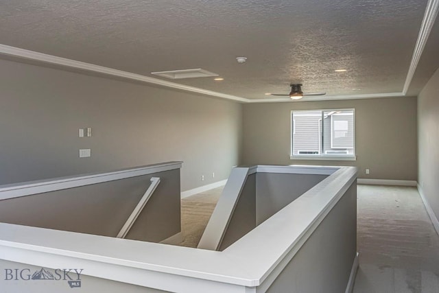 2133 Stewart Loop, Bozeman, MT 59718 - unfurnished room with a textured ceiling, ceiling fan, and light colored carpet