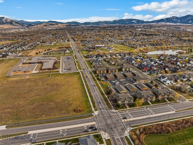 aerial view with a water and mountain view