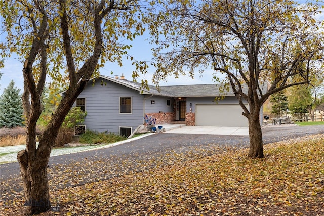 ranch-style house with a garage