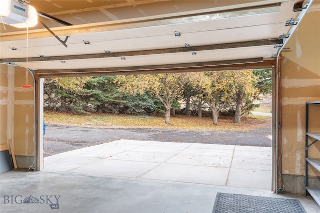 garage featuring a garage door opener