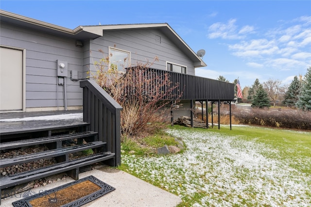 exterior space with a lawn and a deck