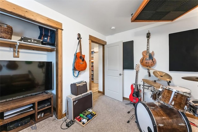 game room with light colored carpet