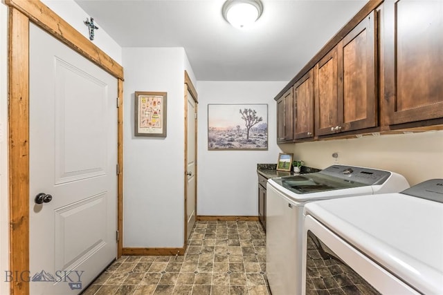 laundry area with cabinets and independent washer and dryer