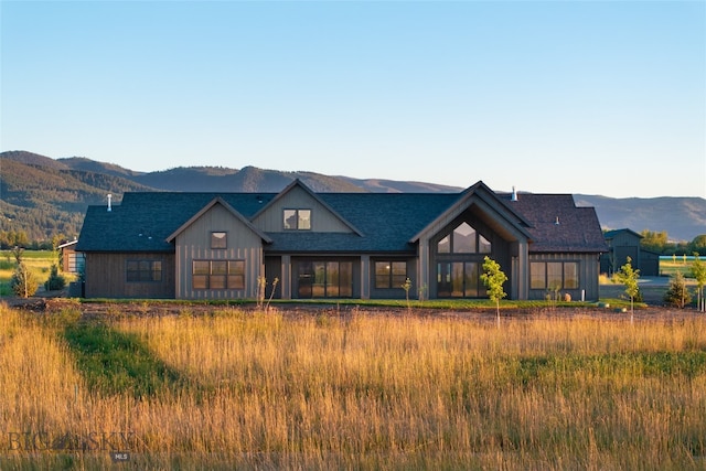 view of front of home with a mountain view