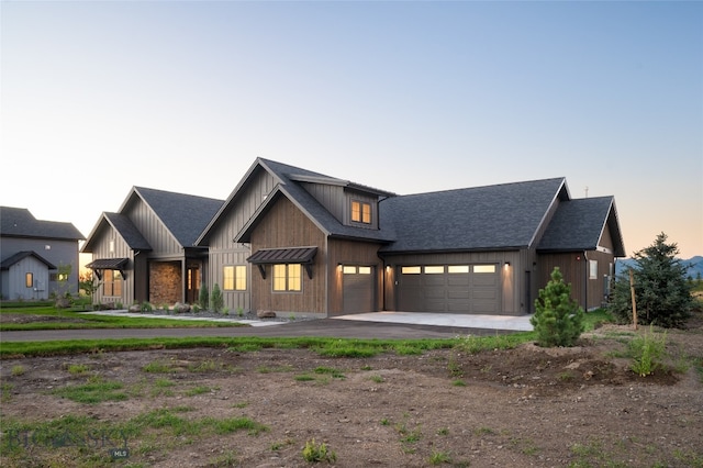 modern farmhouse style home with a garage