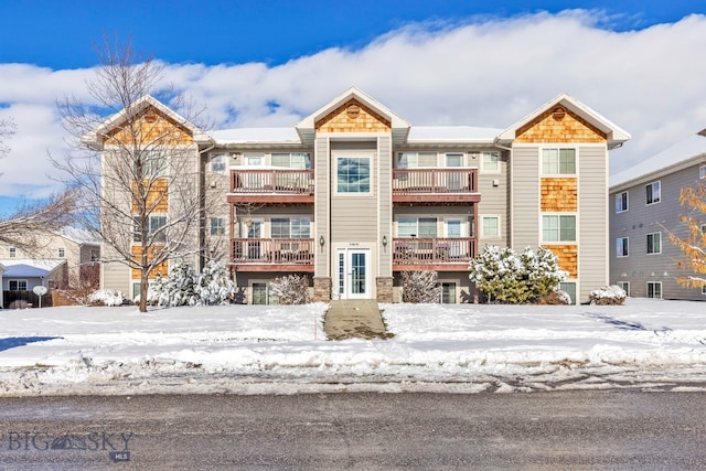 view of snow covered property