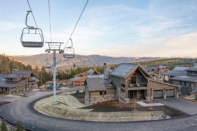 exterior space featuring a mountain view and a garage