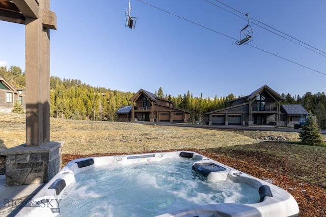 117 Martingale Frk Unit 6, Big Sky, MT 59716 - view of yard featuring a hot tub