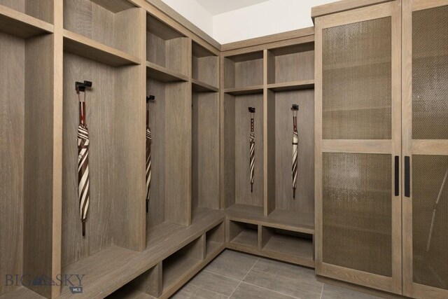 117 Martingale Frk Unit 6, Big Sky, MT 59716 - mudroom featuring tile patterned flooring