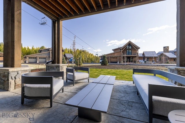 view of patio featuring a garage