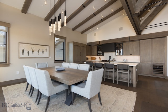 dining area featuring dark hardwood / wood-style flooring, sink, high vaulted ceiling, beamed ceiling, and wine cooler