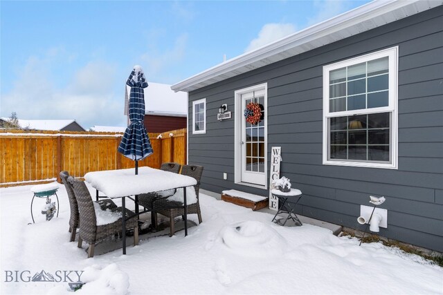 view of snow covered deck