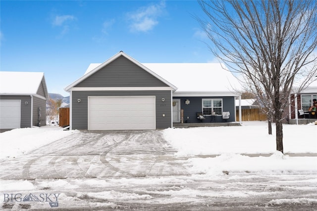 single story home with a garage